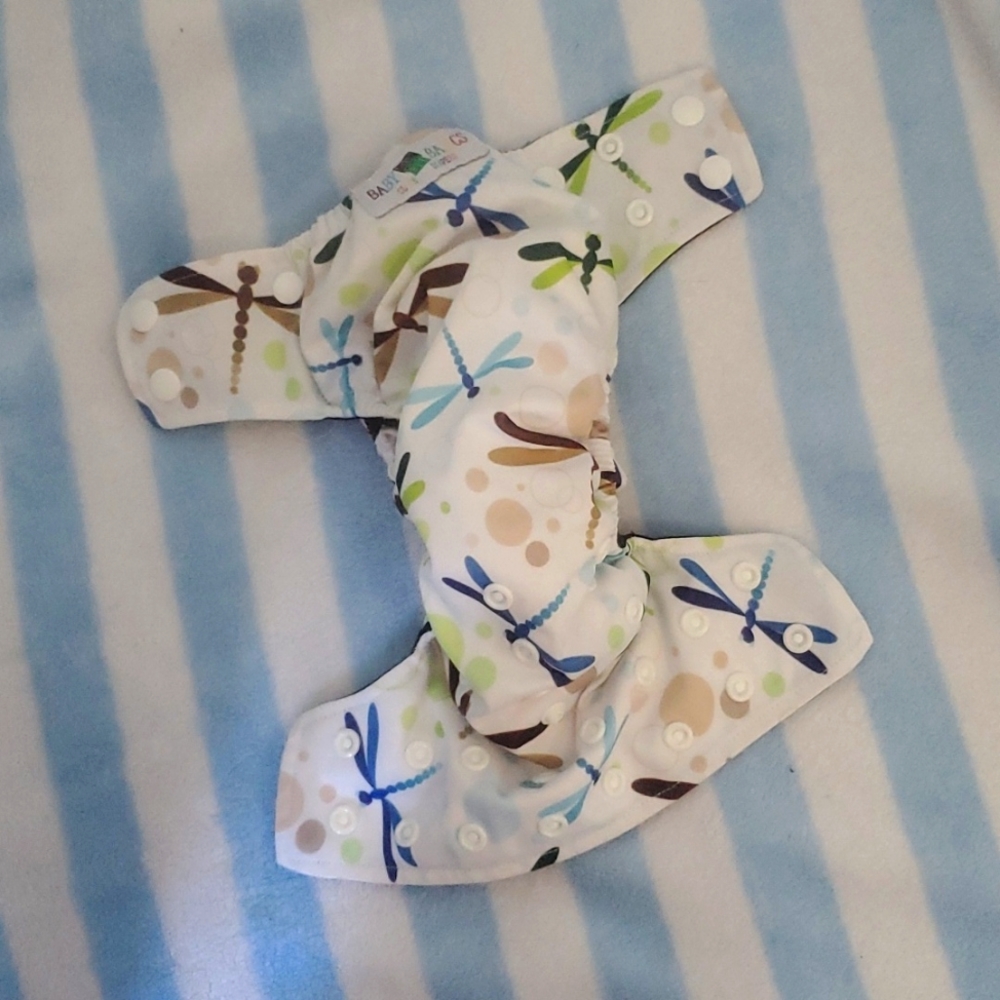 Unused reusable diaper in dragonfly print